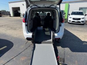 White Chrysler Pacifica with Driverge Rear Entry Manual Fold Out conversion
