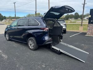 Blue Toyota Sienna with Driverge Rear Entry Manual Fold Out conversion