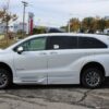 White Toyota Sienna with BraunAbility Side Entry Automatic Fold Out conversion