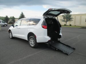 White Chrysler Voyager with FR Conversions Rear Entry Manual Fold Out conversion