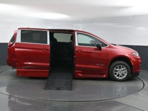 Red Chrysler Pacifica with BraunAbility Side Entry Automatic Fold Out conversion