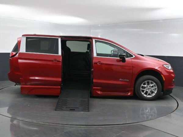Red Chrysler Pacifica with BraunAbility Side Entry Automatic Fold Out conversion