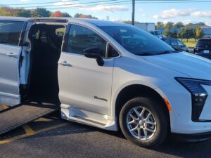 White Chrysler Pacifica with BraunAbility Side Entry Automatic In Floor conversion