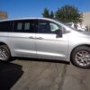 Silver Chrysler Pacifica with Driverge Rear Entry Manual Fold Out conversion