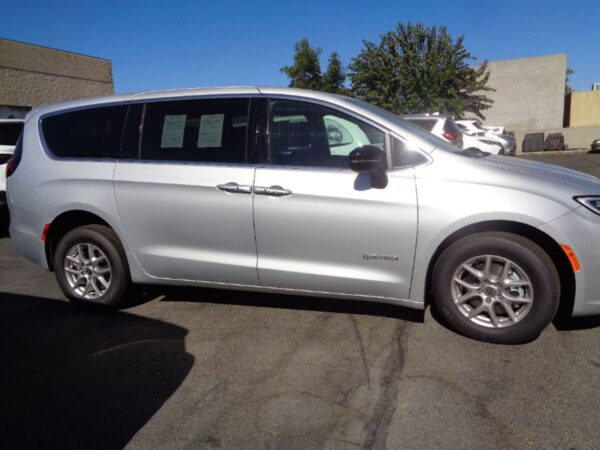 Silver Chrysler Pacifica with Driverge Rear Entry Manual Fold Out conversion