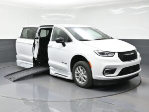 White Chrysler Pacifica with BraunAbility Side Entry Automatic Fold Out conversion