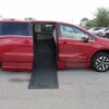 Red Honda Odyssey with BraunAbility Side Entry Automatic In Floor conversion