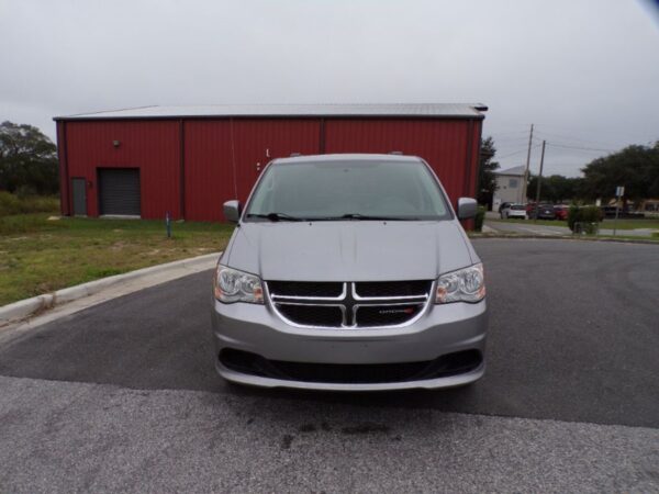 Silver Dodge Grand Caravan with Vantage Mobility Side Entry Automatic In Floor conversion