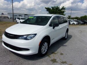 White Chrysler Voyager with BraunAbility Rear Entry Manual Fold Out conversion
