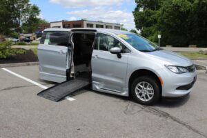 Silver Chrysler Voyager with BraunAbility Side Entry Automatic Fold Out conversion