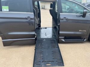 Grey Chrysler Voyager with BraunAbility Side Entry Automatic Fold Out conversion