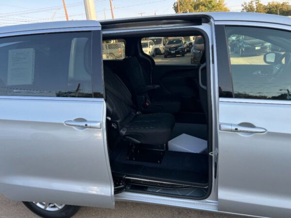 Silver Chrysler Pacifica with Driverge Rear Entry Manual Fold Out conversion