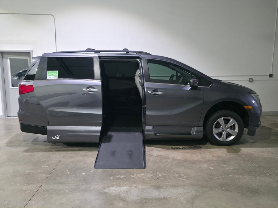 Grey Honda Odyssey with Vantage Mobility Side Entry Automatic In Floor conversion