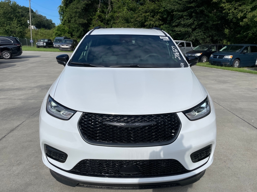 White Chrysler Pacifica with BraunAbility Side Entry Automatic In Floor conversion
