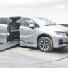Silver Honda Odyssey with BraunAbility Side Entry Automatic In Floor conversion