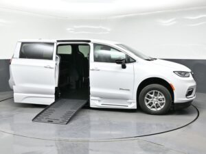 White Chrysler Pacifica with BraunAbility Side Entry Automatic Fold Out conversion