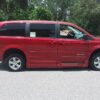 Red Dodge Grand Caravan with BraunAbility Side Entry Manual Fold Out conversion