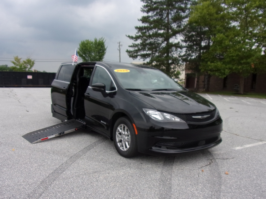 Black Chrysler Voyager with Driverge Side Entry Automatic Fold Out conversion