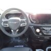 White Chrysler Pacifica with BraunAbility Side Entry Automatic Fold Out conversion