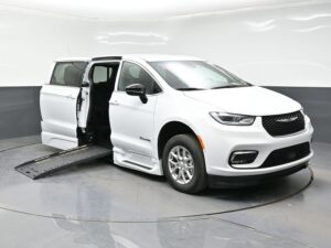 White Chrysler Pacifica with BraunAbility Side Entry Automatic Fold Out conversion