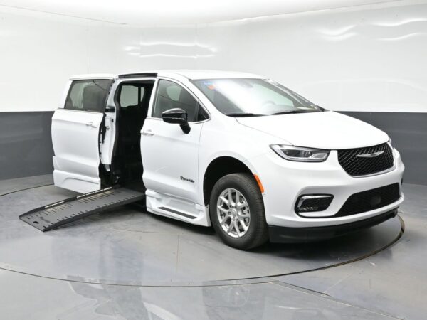 White Chrysler Pacifica with BraunAbility Side Entry Automatic Fold Out conversion
