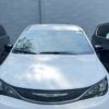 White Chrysler Voyager with Driverge Side Entry Automatic Fold Out conversion