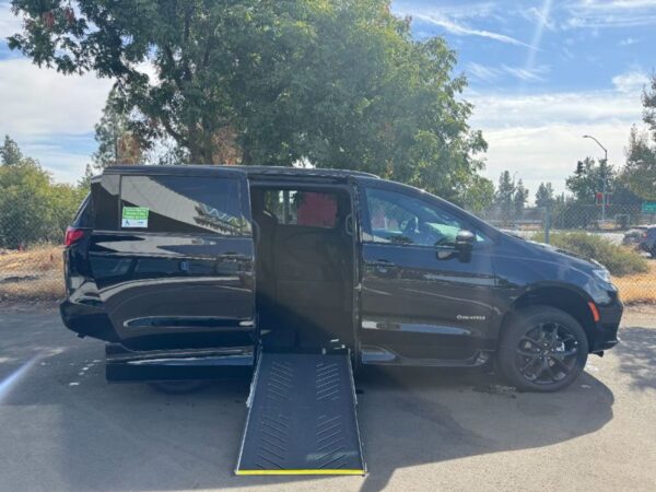 Black Chrysler Pacifica with Driverge Side Entry Automatic Fold Out conversion