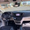White Chrysler Voyager with Driverge Side Entry Automatic Fold Out conversion