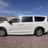 White Chrysler Pacifica with BraunAbility Side Entry Automatic Fold Out conversion