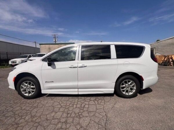 White Chrysler Pacifica with BraunAbility Side Entry Automatic Fold Out conversion