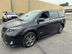 Black Toyota Sienna with BraunAbility Side Entry Automatic In Floor conversion