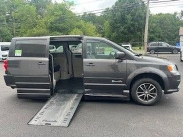 Grey Dodge Grand Caravan with BraunAbility Side Entry Automatic Fold Out conversion