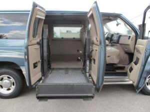 Blue Ford E-Series with Other Side Entry Automatic Fold Out conversion