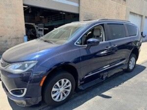 Blue Chrysler Pacifica with BraunAbility Side Entry Automatic In Floor conversion