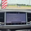 White Chrysler Voyager with BraunAbility Rear Entry Manual Fold Out conversion
