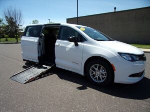 White Chrysler Voyager with Driverge Side Entry Automatic Fold Out conversion