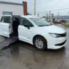 White Chrysler Voyager with Driverge Side Entry Automatic Fold Out conversion