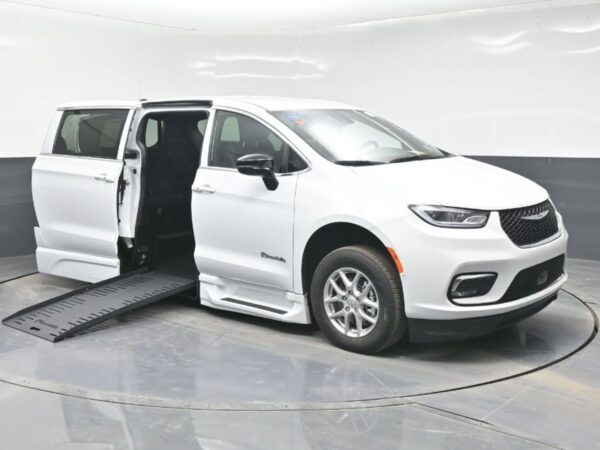 White Chrysler Pacifica with BraunAbility Side Entry Automatic Fold Out conversion
