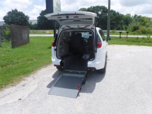 White Chrysler Pacifica with Driverge Rear Entry Manual Fold Out conversion