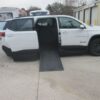 White Chevrolet Traverse with BraunAbility Side Entry Automatic In Floor conversion