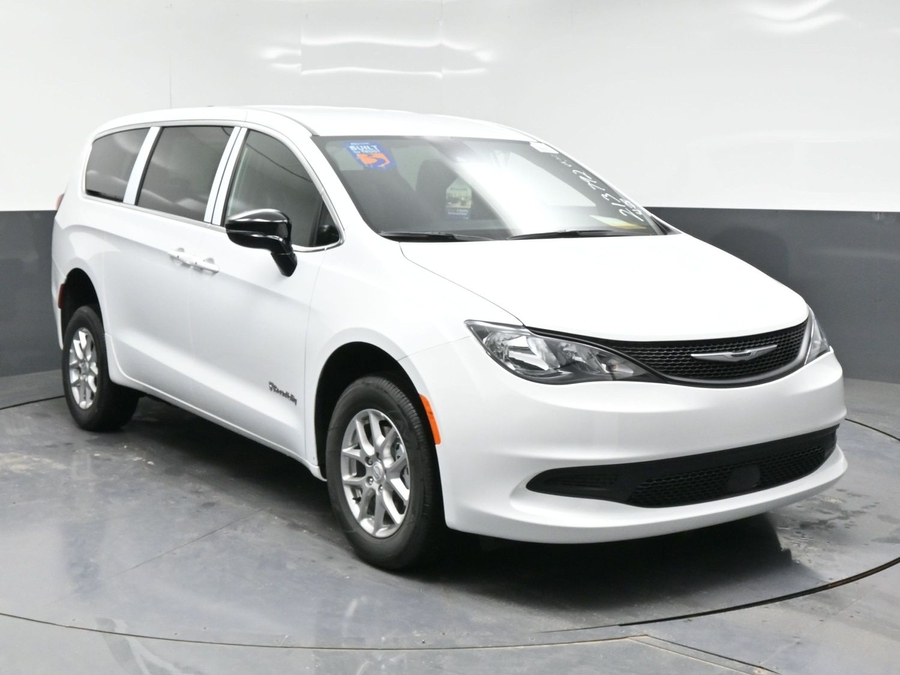White Chrysler Voyager with BraunAbility Rear Entry Manual Fold Out conversion