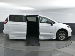 White Chrysler Pacifica with BraunAbility Side Entry Automatic Fold Out conversion