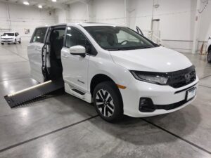White Honda Odyssey with BraunAbility Side Entry Automatic In Floor conversion