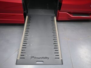 Red Honda Odyssey with BraunAbility Side Entry Automatic In Floor conversion