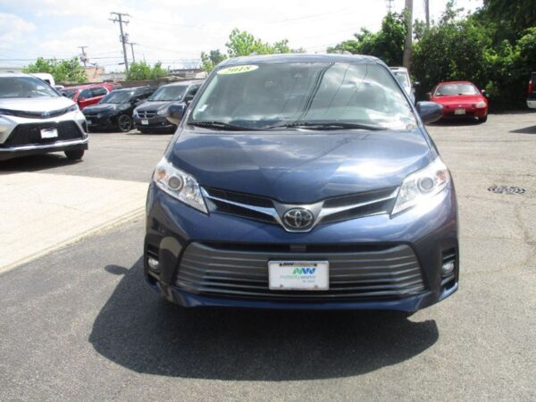 Blue Toyota Sienna with BraunAbility Side Entry Automatic Fold Out conversion