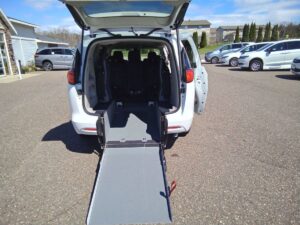 White Chrysler Voyager with Driverge Rear Entry Manual Fold Out conversion