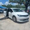 White Chrysler Voyager with Driverge Side Entry Automatic Fold Out conversion