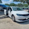 White Chrysler Voyager with Driverge Side Entry Automatic Fold Out conversion