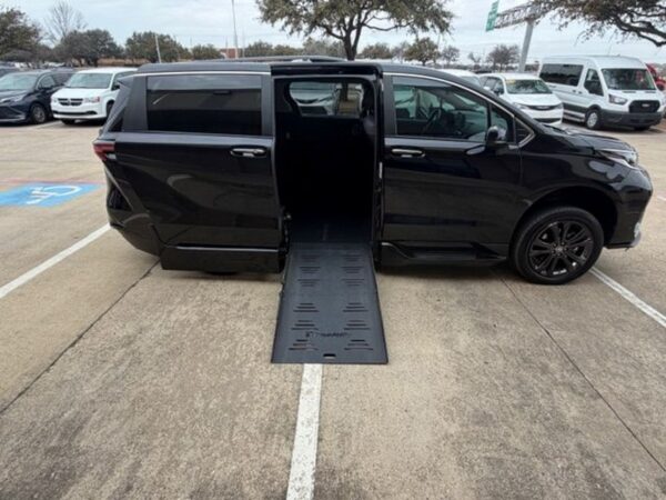 Black Toyota Sienna with BraunAbility Side Entry Automatic Fold Out conversion