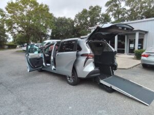 Silver Toyota Sienna with Driverge Rear Entry Manual Fold Out conversion